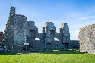 Fototapeta na wymiar Dunluce Castle ruins at Northern Ireland in a sunny day.