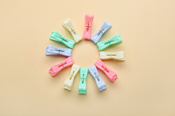 Plastic clothes pins on light background