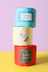 Toilet paper rolls on color background