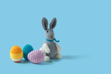Happy Easter crochet composition. Rabbit and Easter eggs made in crochet and colored wool....