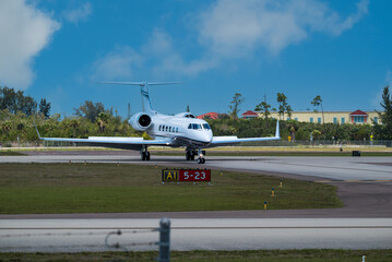 Fototapeta premium Private Jet Sitting On The Runway At An Airport AFter Landing