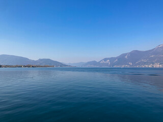 Bergamo, Italy: 10-02-2022: Panoramic of Lake Iseo, the fourth largest&nbsp;lake&nbsp;in&nbsp;Lombardy, Italy, fed by the&nbsp;Oglio River.