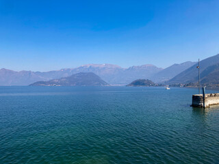 Fototapeta premium Bergamo, Italy: 10-02-2022: Panoramic of Lake Iseo, the fourth largest&nbsp;lake&nbsp;in&nbsp;Lombardy, Italy, fed by the&nbsp;Oglio River.