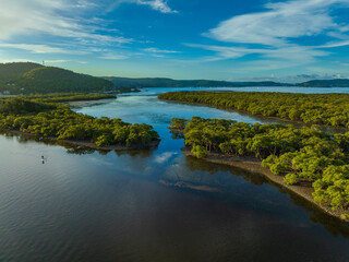 Early evening flight over the bay