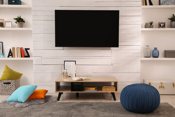 Cozy room interior with stylish decor and modern TV set