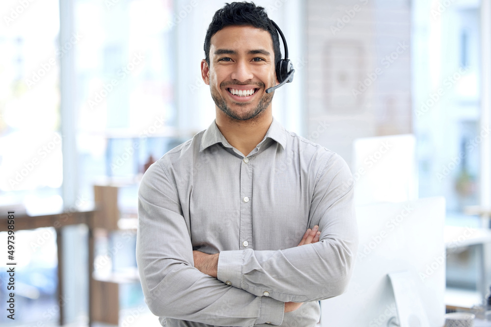 Poster give me any query and ill get it fixed. portrait of a young businessman using a headset in a modern 