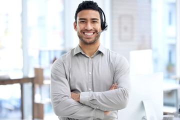 Give me any query and Ill get it fixed. Portrait of a young businessman using a headset in a modern...