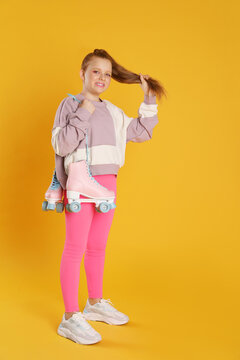 Cute Indie Girl With Roller Skates On Yellow Background