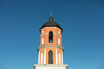 Bell tower of temple. Orthodox church. Religious building.