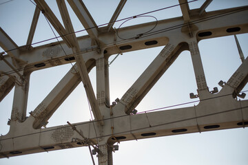 Naklejka premium Steel bridge supports. Railway bridge is in detail.