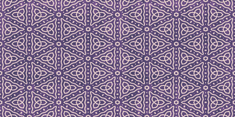 Seamless vintage violet intricate retro art deco batik pattern on weathered boho textured fabric, a trendy contemporary ethnic tribal textile for interior decor and fashion.