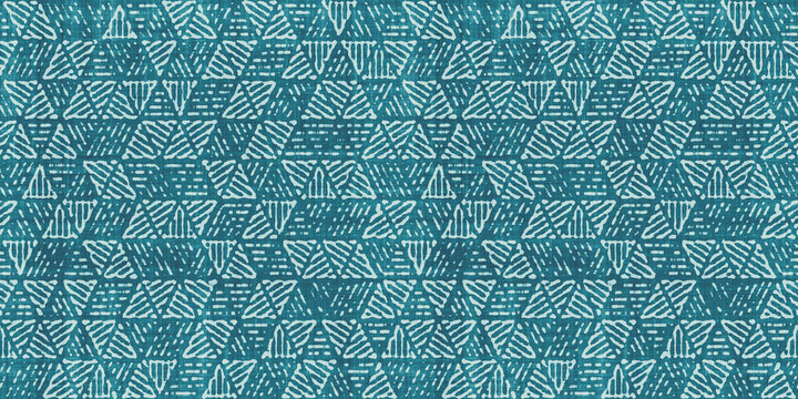 Seamless retro triangles batik surface pattern design on weathered boho textured linen, a trendy tileable abstract geometric hexagon shibori textile for interior decor and fashion.