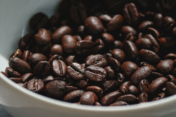 close up of coffee beans in a bowl