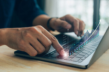 Business finance technology and investment concept, Man typing keyboard on laptop or computer