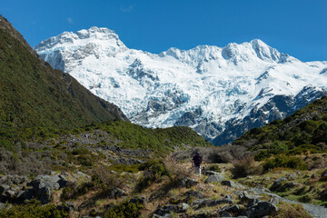 Fototapeta na wymiar Hiking Kea Point track at Mt Cook National Park, Mt Sefton and the Footstool mountains towering above the track, New Zealand.