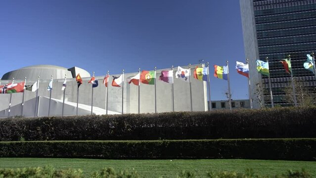 Flags flying in the wind, Slow motion flags from different countries. International flags at the United Nations in New York City. World council flags