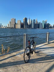 bicycle in the pier with view of NYC