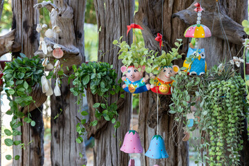 Ornamental doll It was hung on the tree to make it colorful.