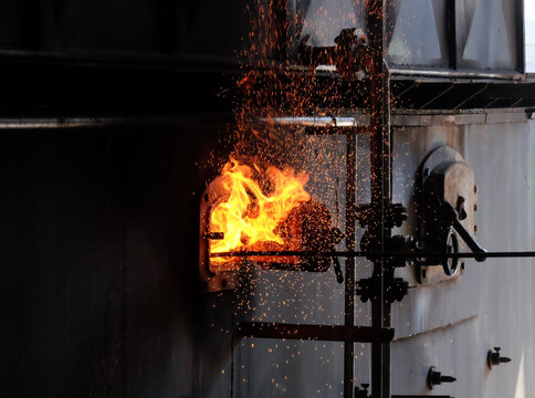 Coal in a steam boiler in a factory