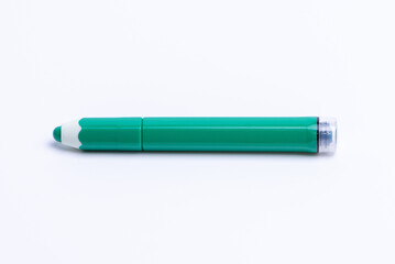 A green color marker isolated on white background.