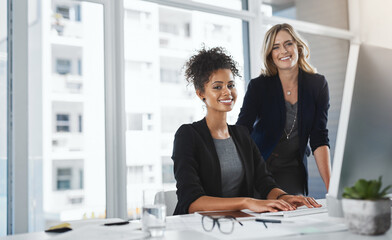 At at end of it all, success is always inevitably ours. Portrait of two businesswomen working...