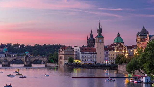 View of the city Prague in Czech Republic day to night timelapse on the Vltava river with beautiful sky