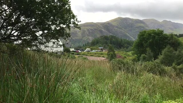 The Jacobite Steam Train (also known as Hogwart's Express from the Harry Potter movies) passes close by over the West Highland Railway, Scotland