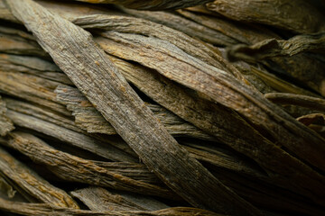 A bundle of dried shallot leaves.