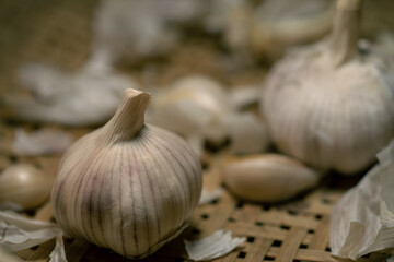 Garlic bulbs and cloves in a basket.