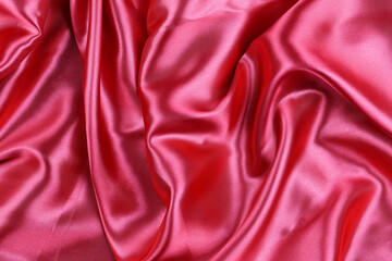 Red wrinkled cloth background for design in your work concept.