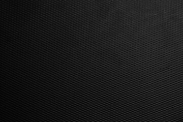 Pattern of black plastic or metal texture background for design.