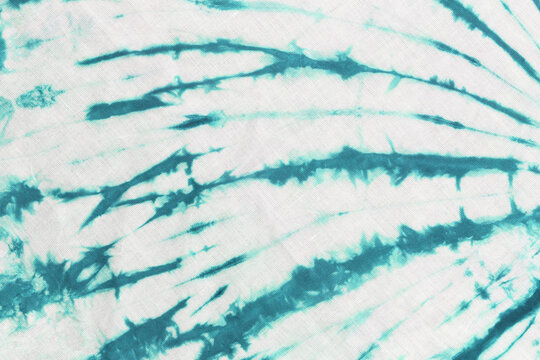 Green Tie Dye Fabric Texture Background.