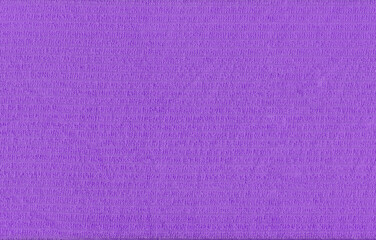 Purple fibers of microfiber cloth background.