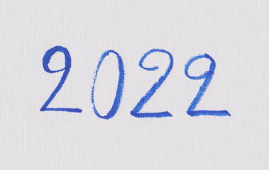 Two thousand and twenty two letters on white art paper.