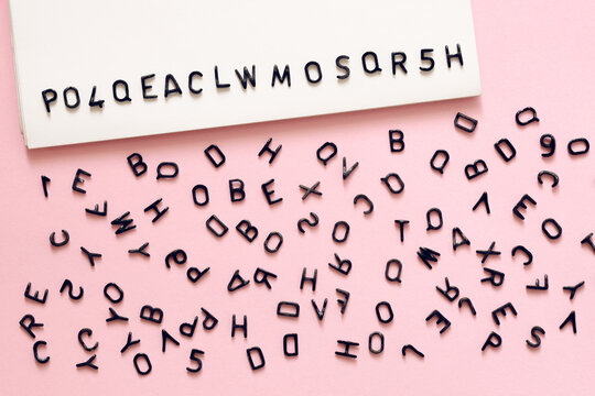 scattered letters, alphabet on pink background, write, read, grammar concept, Choose a security password