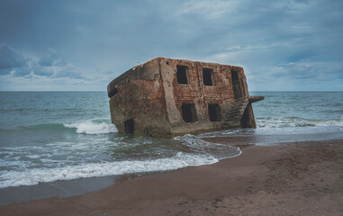 Destroyed frame of a house in the Baltic Sea. The remains of the military fort of the Russian army...