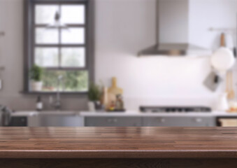 Wood table on blur kitchen room background. For montage product display or design key visual layout