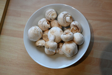 rustic White organic Mushrooms. plant based cooking ingredients. vegan and vegetarian cuisine. food prep
