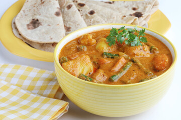 Mix Vegetable curry in a bowl, Indian restaurant style veg recipe served with Chapati