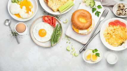 Various ways of cooking chicken eggs on light background.