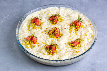 Close-up walnut gullac dessert. Traditional Ramadan dessert. Middle Eastern desserts.
