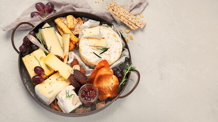 Cheese assortment on light background.