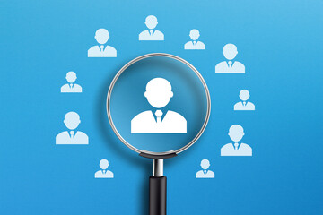 Human resources and management concept, magnifier and business people icon on blue background