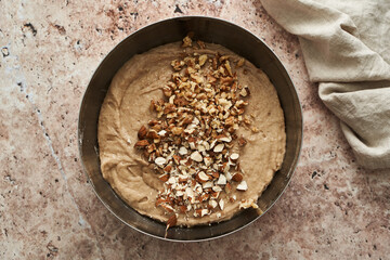 the stage of preparation of banana cake with nuts