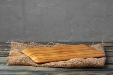 Wooden board for food on wooden background