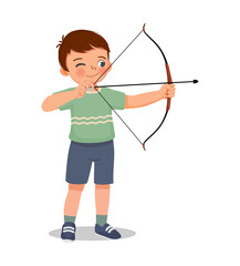 happy cute little boy with bow and arrow doing archery sport aiming ready to shoot - obrazy, fototapety, plakaty