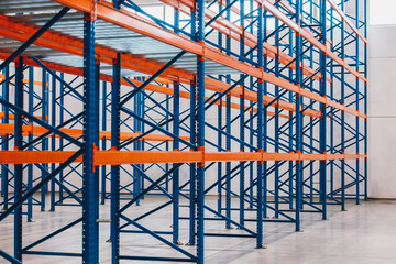 Photo of a modern warehouse, all empty because of crises.