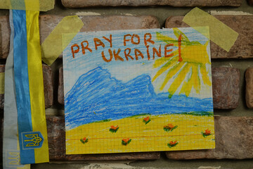 Children's drawing for peace against the 2022 Russian Invasion of Ukraine  are placed on the white background  