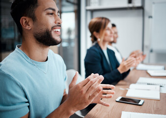 Proud to be a part of this team. Shot of a group of coworkers clapping during a business meeting.