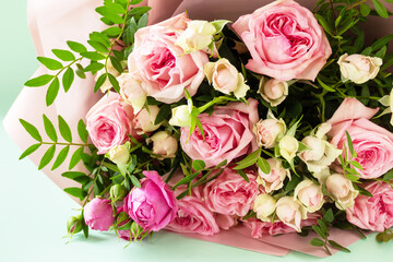 Mother's day, womens day or birthday card. Beautiful bouquet of blooming delicate pink roses.